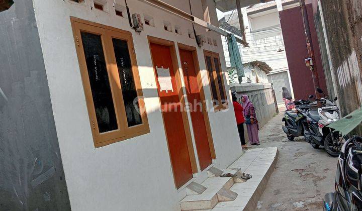 Rumah kontrakan 4 pintu 2 lantai,i Jalan kampung dua SHM 2