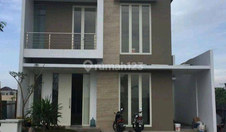 Rumah modern minimalis pakuwon city 1