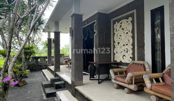 Rumah Minimalis di Belayu Marga dengan Halaman yang Luas 1
