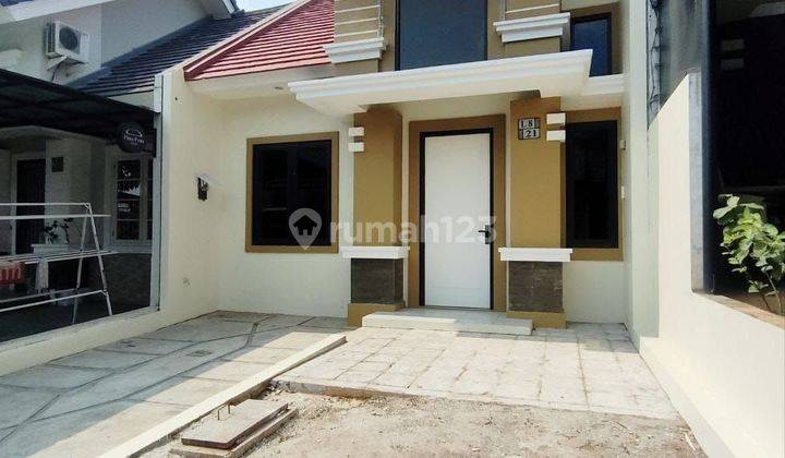 Rumah 1,5 Lantai Legenda Wisata Cibubur  1