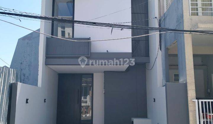 JUAL RUMAH MODERN HOUSE DHARMAHUSADA BARU GRESS 1