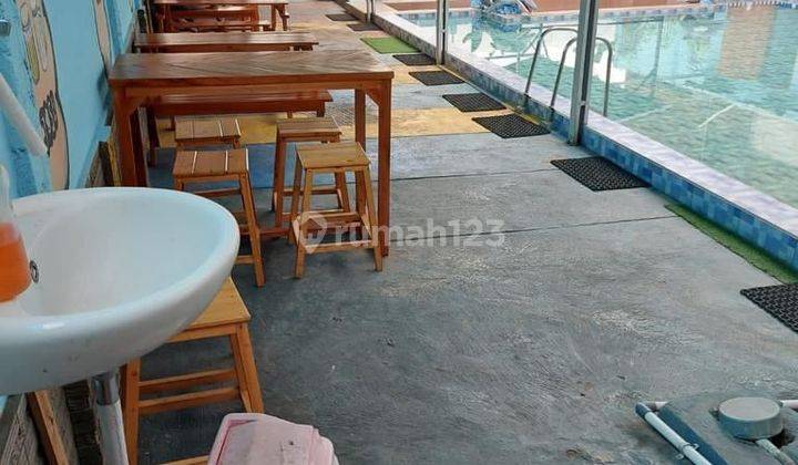 Dijual rumah pinggir jalan ada kolam renang  2