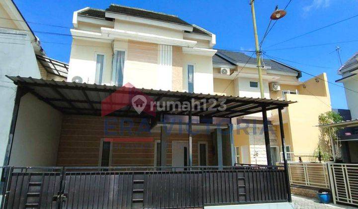 Rumah Minimalis Modern 2 Lantai di Daerah Sulfat 1