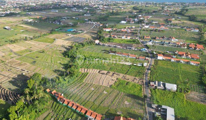 Strategic plot of land in front of the main road to Seseh Beach 2