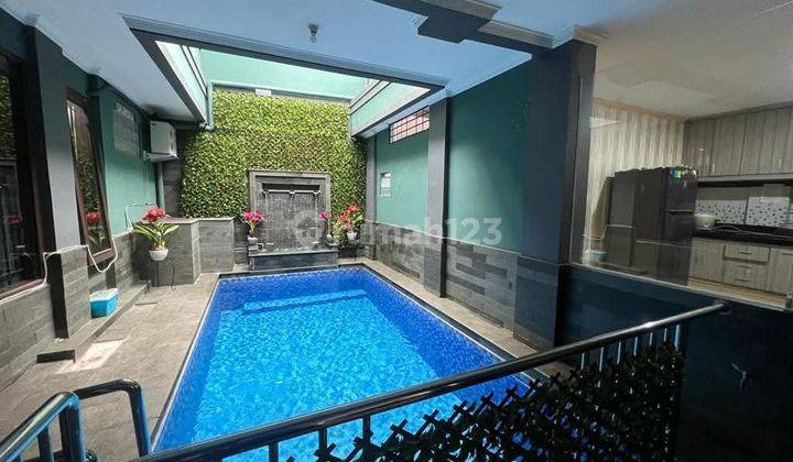 Disewakan rumah mewah pool furnish di pasteur bandung kota kolam renang 1