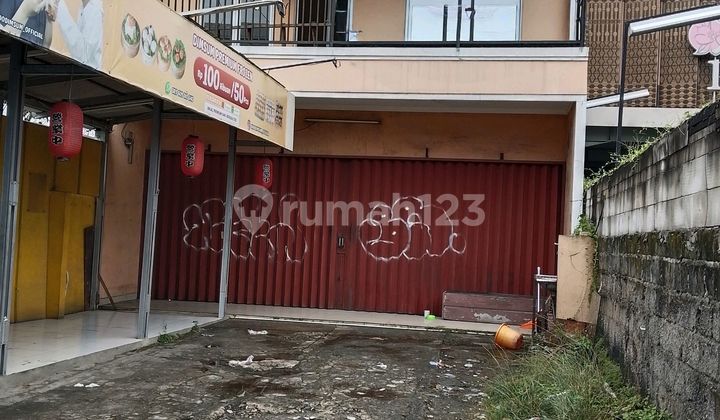 2-story shop house, located on the side of Cinere Main Road, Depok.