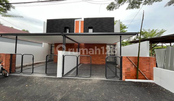 Rumah Modern Tropical di Arcamanik Endah Rumah Modern Tropical di Arcamanik Endah