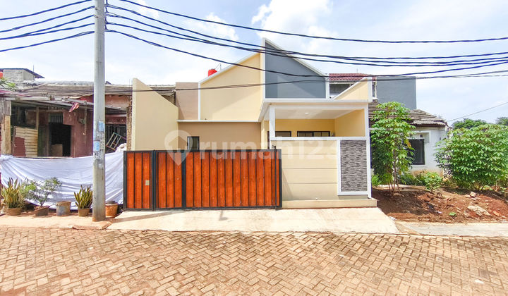 Rumah 15 Menit ke Stasiun Cisauk SHM Hadap Timur Dibantu KPR J-38022 Rumah 15 Menit ke Stasiun Cisauk SHM Hadap Timur Dibantu KPR J-38022