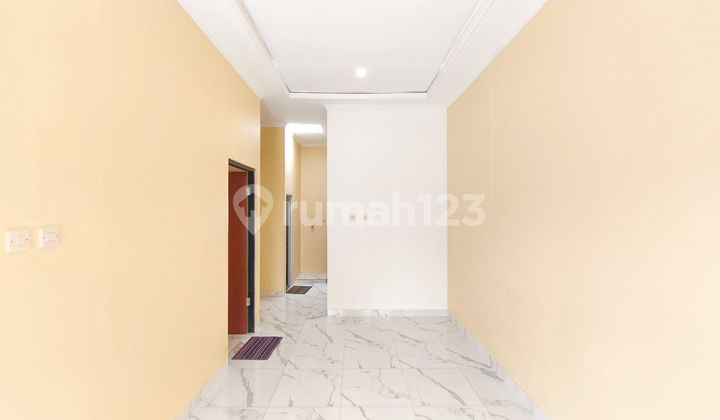 Rumah 15 Menit ke Stasiun Cisauk SHM Hadap Timur Dibantu KPR J-38022 2