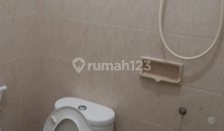 Rumah Tanah Luas 13 Menit ke Stasiun Depok Baru Dibantu KPR J34395 2