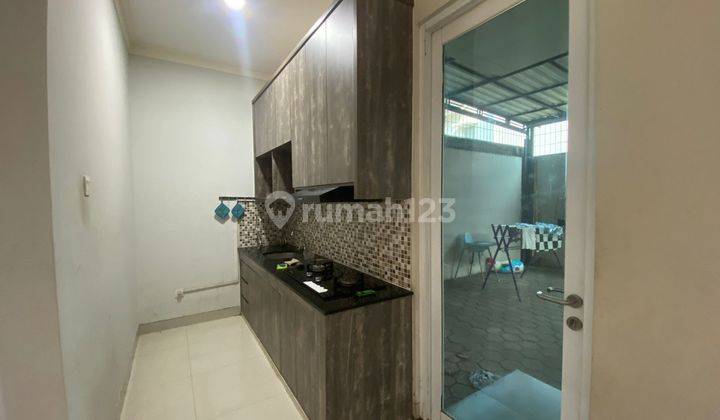 dapur rumah siap huni dengan furnished
