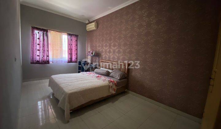 kamar tidur rumah homey dan asri 2
