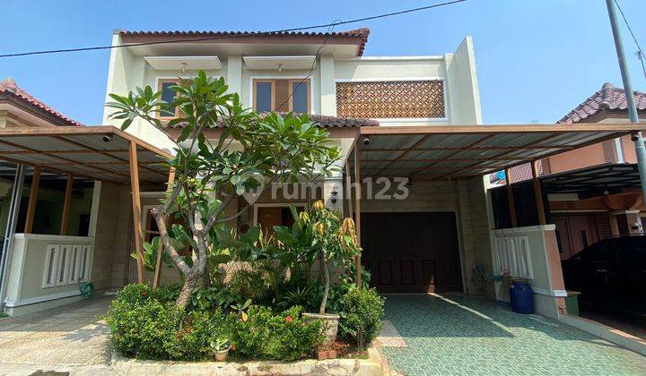 tampak depan rumah homey dan asri 2