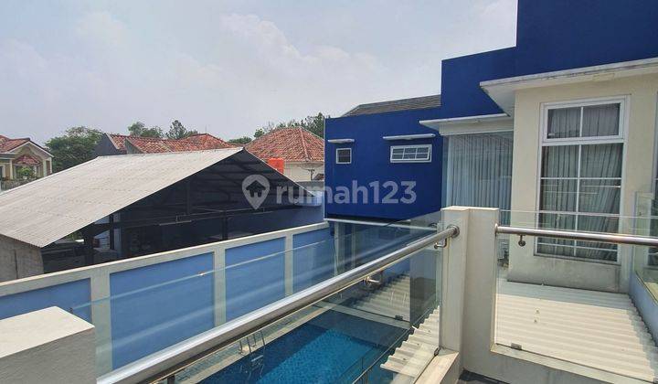 Rumah ada Kolam Renang kamar ada 6 di Kotawisata 2