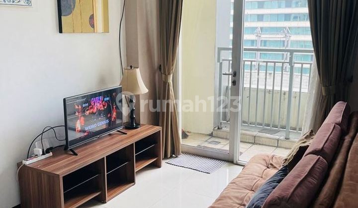Disewakan Apartemen Cosmo Mansion 2 Bedroom Lantai Sedang 1