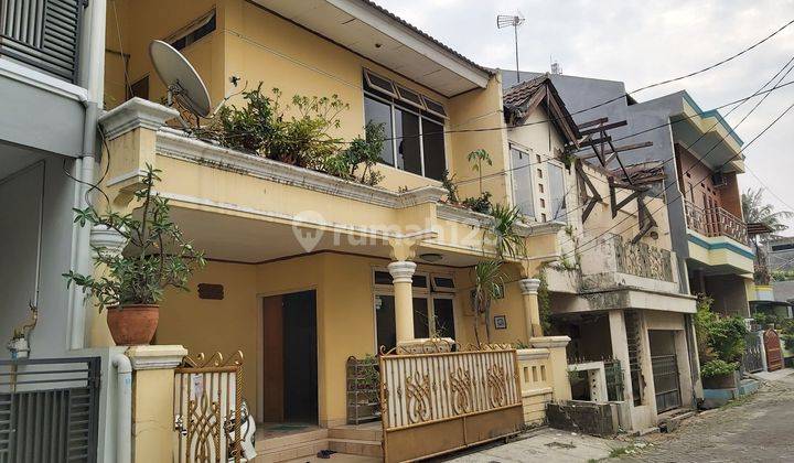 Rumah 2 Lantai Murah di Jalan Bumi Satria Kencana SHM Butuh Renovasi Timur 1