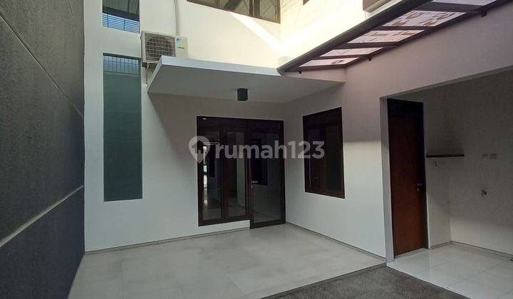 Rumah Town House Holis Siap Pakai 1