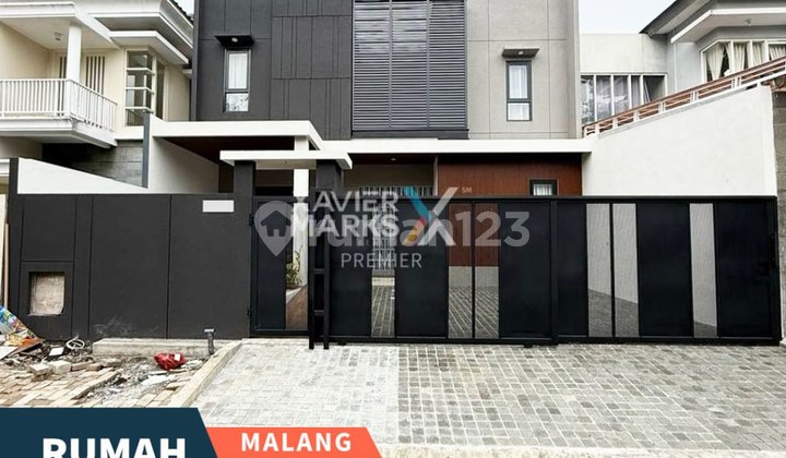 Rumah Design Modern Tropis Di Cluster Golf Kota Araya Malang 1