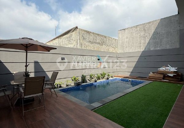 Rumah Design Modern Tropis Di Cluster Golf Kota Araya Malang 2