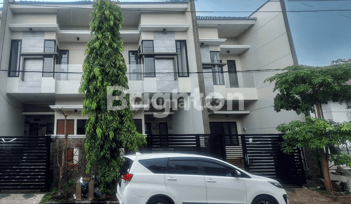 RUMAH BERGAYA MODEREN TROPICAL DI SUTOREJO PRIMA  SURABAYA TIMUR 1