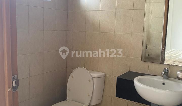 Modern Tropical House Cosmo Park Residence Thamrin City (IR) 2