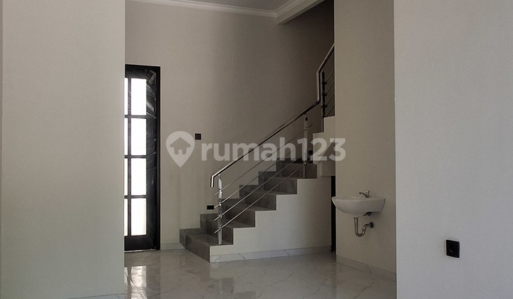 The Only Brand New House in Manyar Under 2M. Close to Schools and Campus. 2