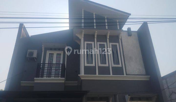 Rumah townhouse 2 lantai strategis 1