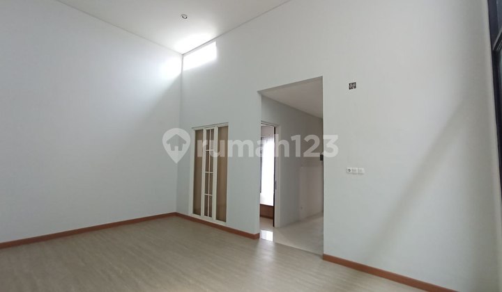 Semi-Furnished Private Cluster House Green Orchid Malang 2