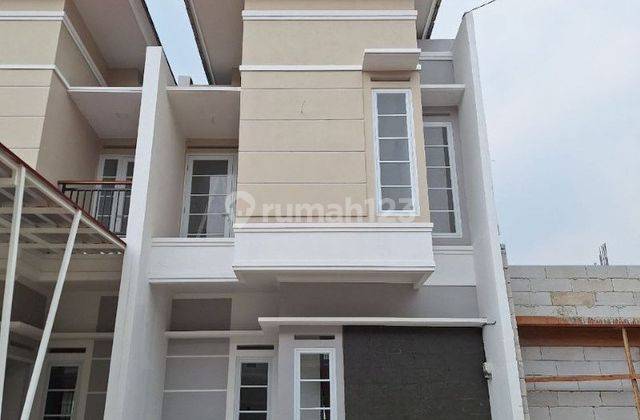 689 Rumah 2 Lt Cantik, Minimalis Modern di Pusat Kota, Pamulang 1