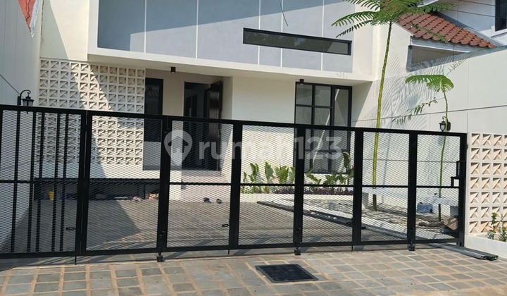 Rumah bangunan baru minimalis modern siap huni di Griya Telaga Permai Tapos, Cibinong