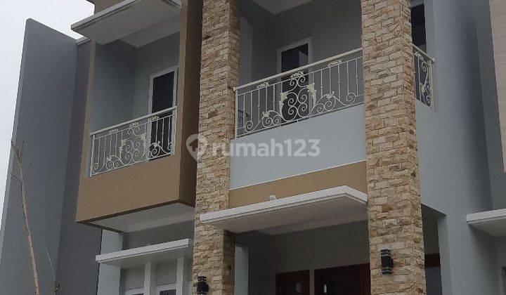 Rumah minimalis modern pas buat keluarga baru Callista Residence 2