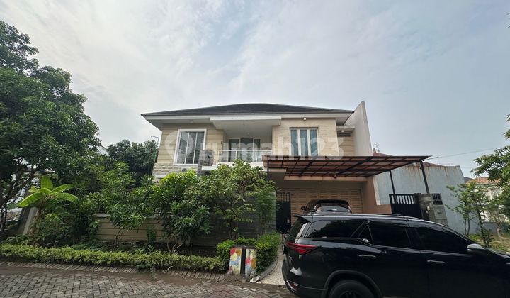 HOUSE IN PAKUWON VILLA VALENSIA HOUSING, BABATAN WIYUNG FOR QUICK SALE WITH FURNITURE