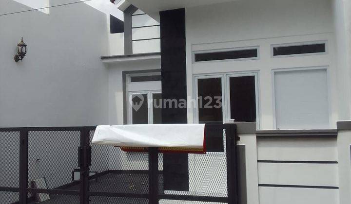 Rumah baru cantik dalam perumahan di Pesona anggrek Bekasi SHM 2