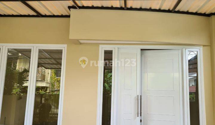 Rumah 5+1 Kamar Carport 2 Mobil di Janur Elok 1