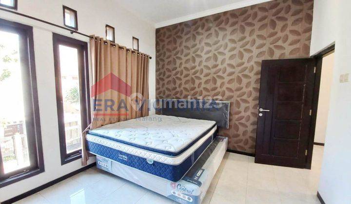 Rumah 2 lantai siap huni dan full furnished dekat fasum dan exit tol 2