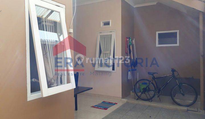 Rumah dalam cluster siap huni di poros jalan letjen sutoyo 2