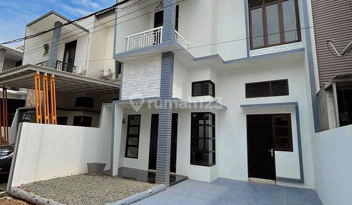 3. RUMAH LUAS 2 LANTAI,BEBAS BANJIR DALAM CLUSTER TOWN HOUSE, DI JATIRADEN, BEKASI 1