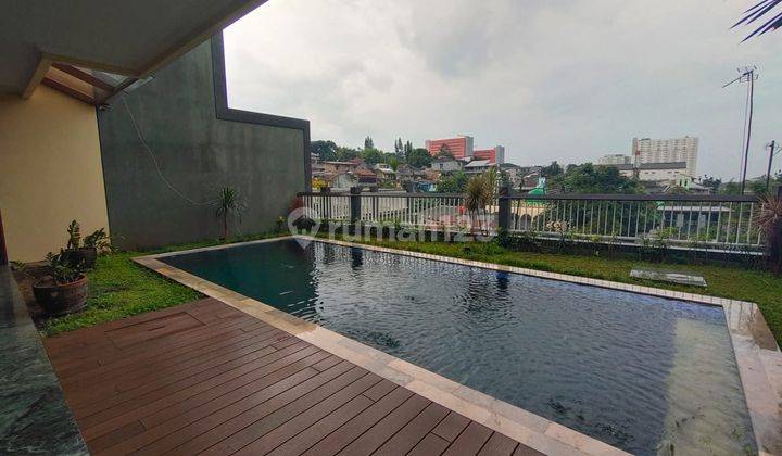 Rumah 3 Lantai Bagus Furnished SHM di Cisatu, Bandung 1