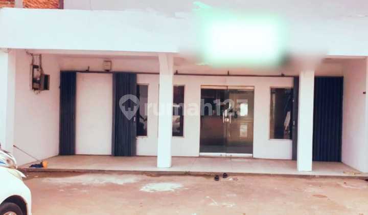 For sale land and former bank building in Parung. 1