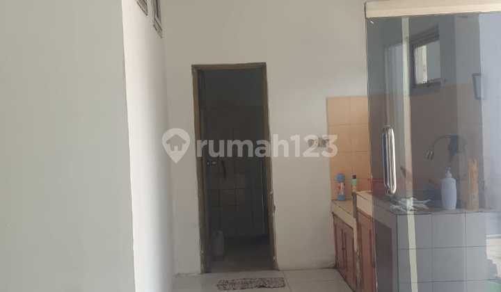 For sale land and former bank building in Parung. 2