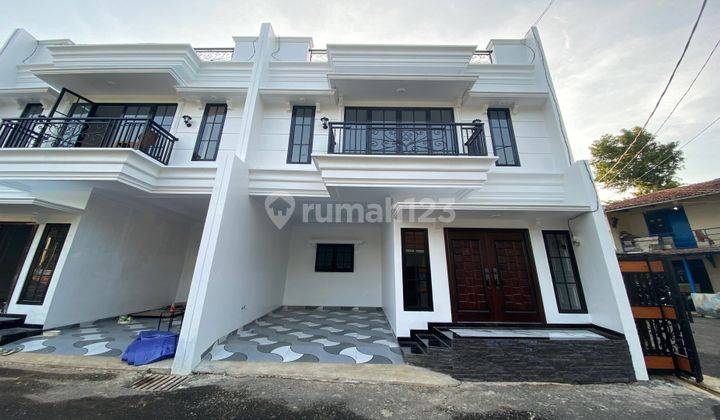 Rumah Bergaya American Classic Di Tb Simatupang Jakarta Selatan, Harga Dibawah Pasaran Plus Memiliki Rooftop 1