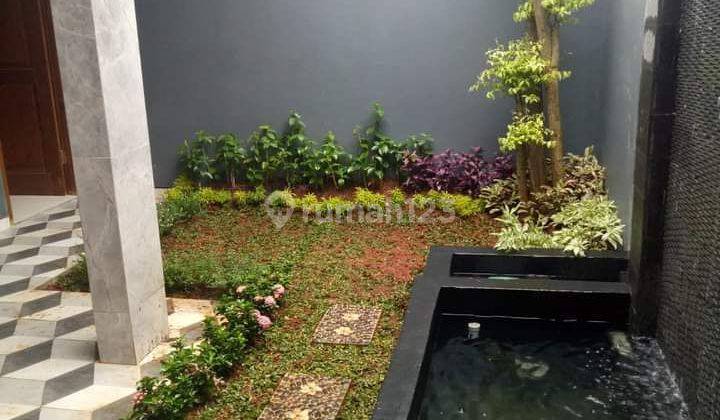 Rumah Full Renovasi Di Taman Belakang Plus Kolam Ikan 2