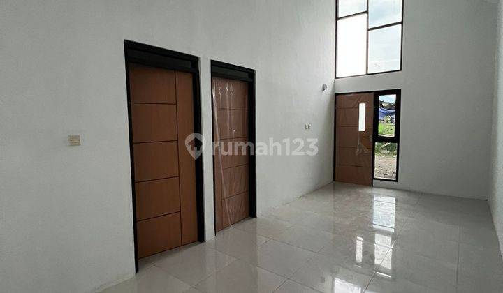 Rumah modern scandinavian pinggir jalan  1