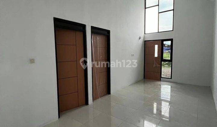 Rumah Minimalis Modern Model Scandinavian Pinggir Jalan Utama  2