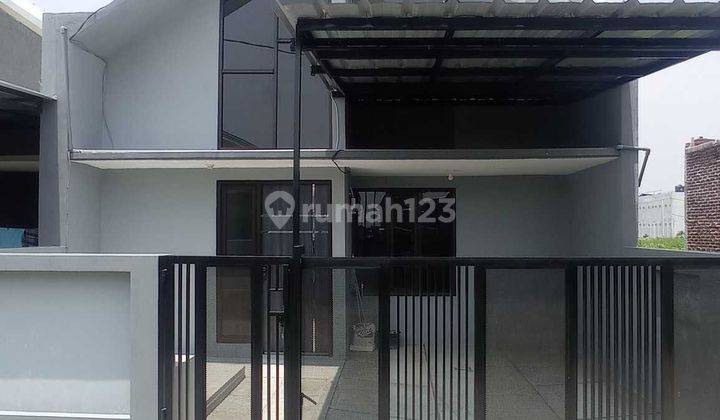 Rumah baru dengan model scandinavian pinggir jalan utama  1