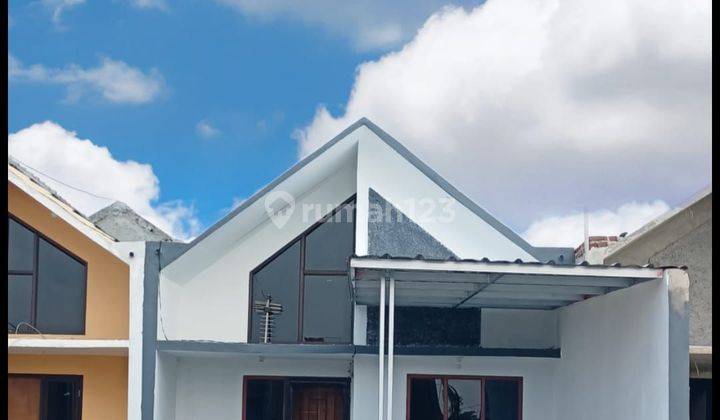 Rumah modern minimalis scandinavian pinggir jalan Baru 1