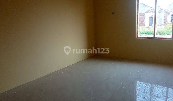 Rumah Modern Minimalis Pinggir Jalan Utama  2