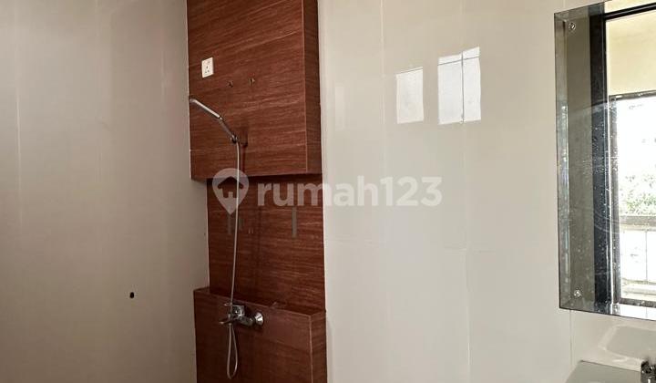 A nice, neat house in a beautiful environment at The Green BSD, close to the toll road.