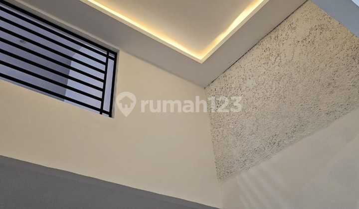 Affordable 1.5-Story House Ready to Occupied with SHM in Sukamenak Indah Complex 2