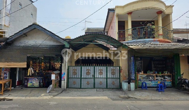 Rumah Satu Setengah Lantai Dengan Ruang Usaha Di Harapan Jaya